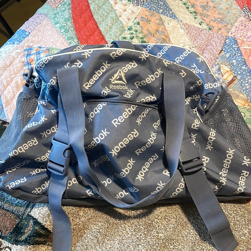 baby blue reebok duffel bag! great for getaway weekend.